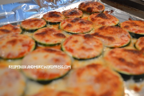 Zucchini Pizza Bites - low carb. Add fave pizza toppings. Bubbly, baked, cheesy goodness.