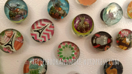 DIY Personalized Magnets -- ModPodge and your fave images, patterns, stickers, behind a clear glass stone